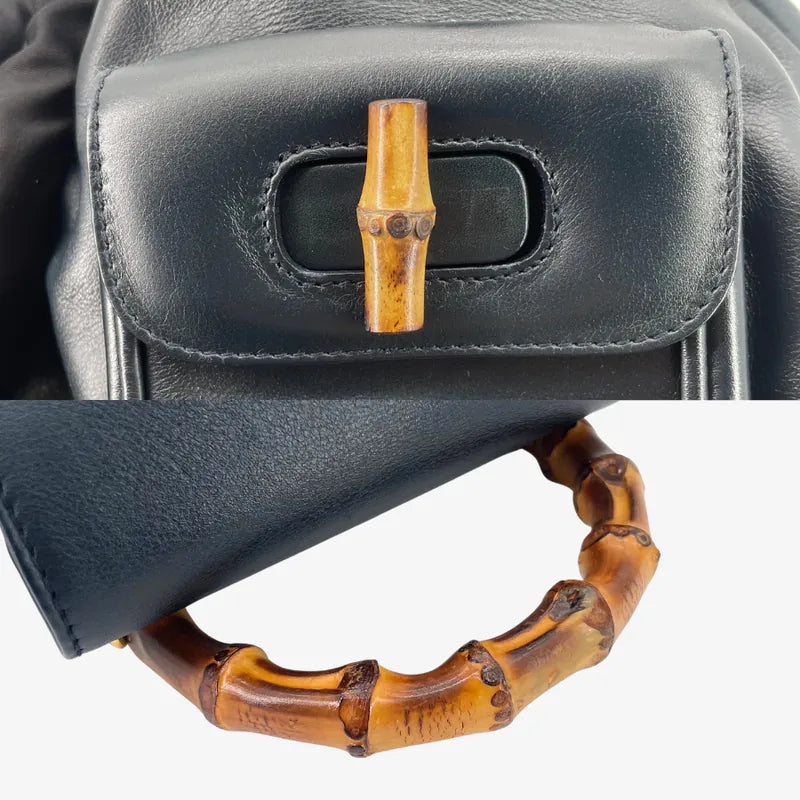 rc147-gucci-vintage-navy-leather-bamboo-backpack