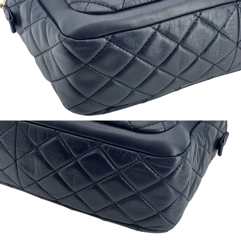 jah189-chanel-vintage-navy-lambskin-quilted-camera-bag
