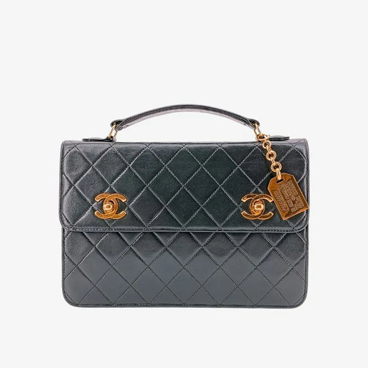 rb245-chanel-vintage-black-lambskin-double-turnlock-flap-bag