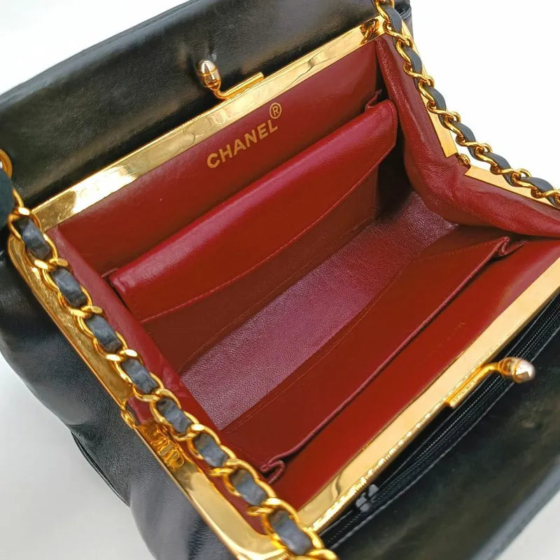 jt293-chanel-vintage-black-lambskin-chevron-handbag