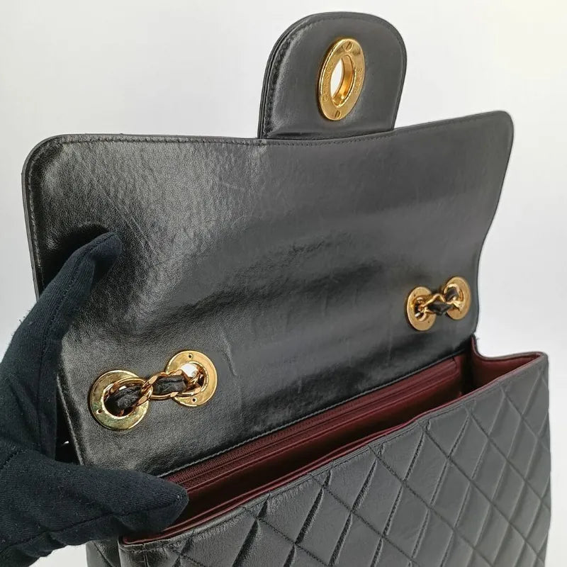 c439-chanel-vintage-black-lambskin-jumbo-classic-flap-bag