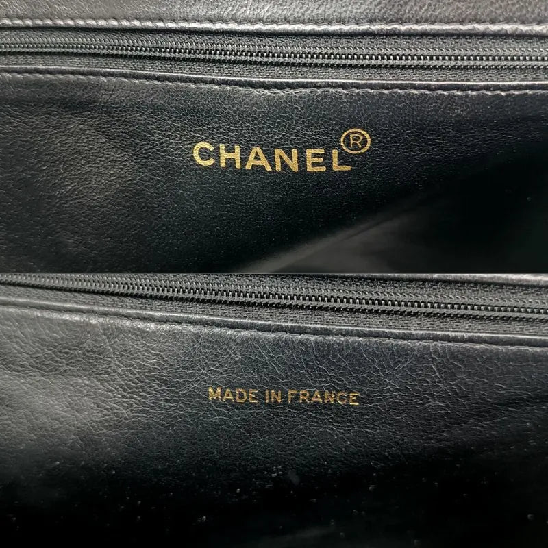 js401-chanel-vintage-black-caviar-leather-embroidered-logo-golden-ball-tote-bag