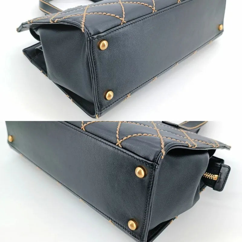 jt415-chanel-vintage-black-calfskin-wild-stitch-handbag