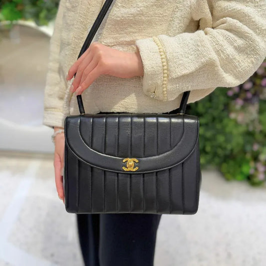 jah183-chanel-vintage-black-lambskin-vertical-flap-bag
