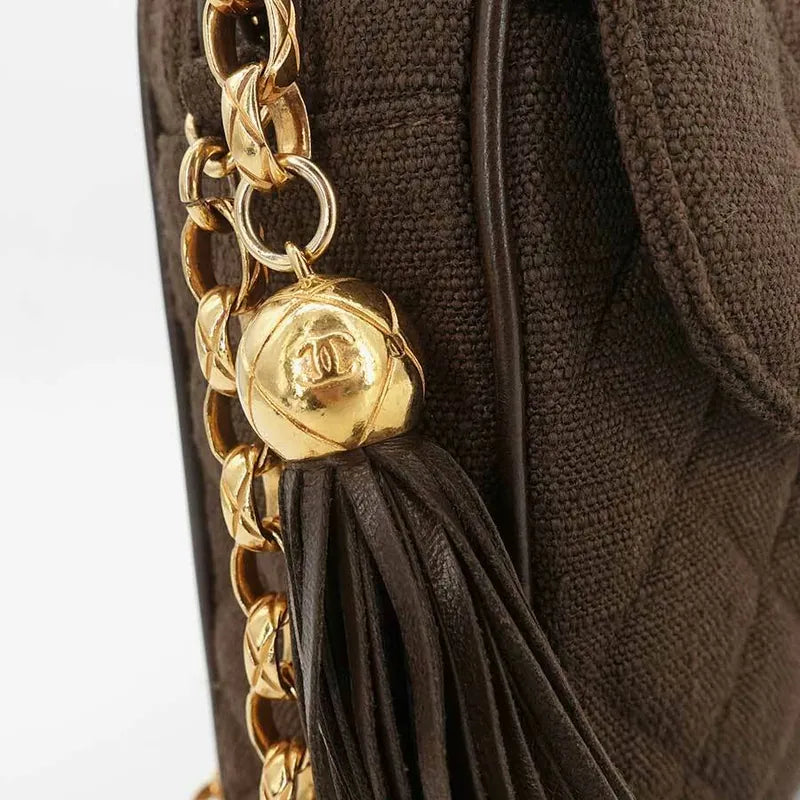 js011-chanel-vintage-brown-linen-gold-chain-camera-bag