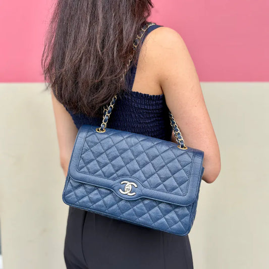 C573 - CHANEL Navy Caviar Leather Flap Bag