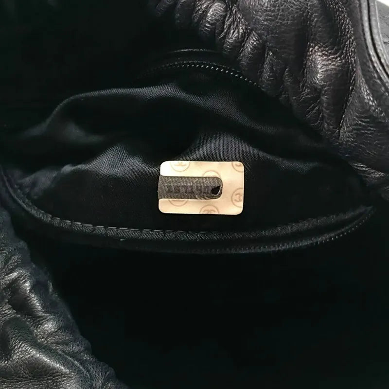 ra586-chanel-vintage-black-lambskin-drawstring-bucket-bag