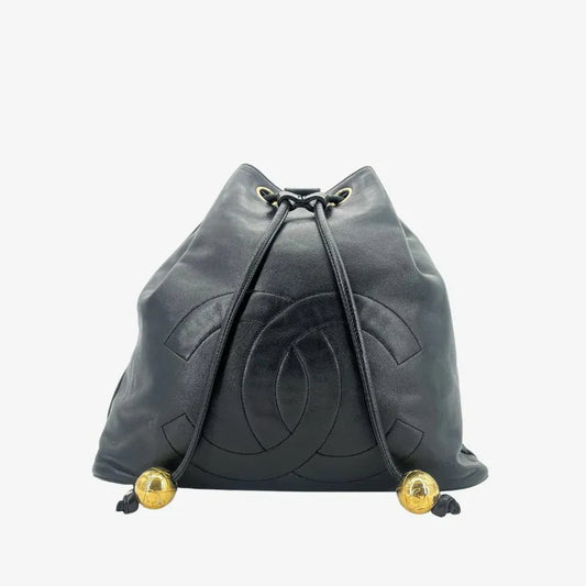 jw571-chanel-vintage-black-lambskin-drawstring-backpack