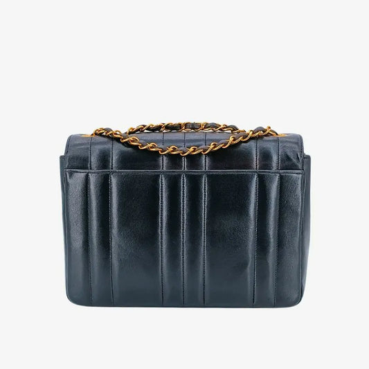 90223956-chanel-vintage-black-lambskin-vertical-flap-bag