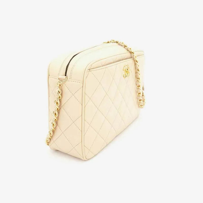 js006-chanel-vintage-beige-lambskin-quilted-camera-bag