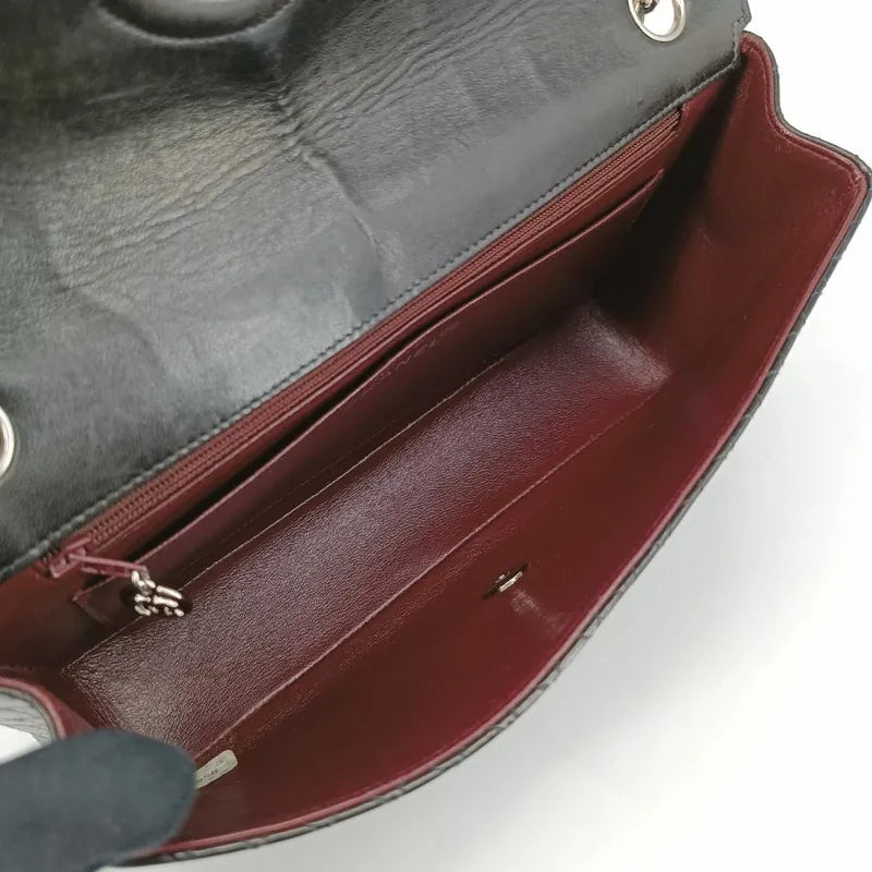 90201267-chanel-vintage-black-lambskin-quilted-flap-bag