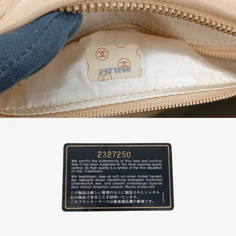 jt248-chanel-vintage-beige-lambskin-tassels-gold-chain-camera-bag