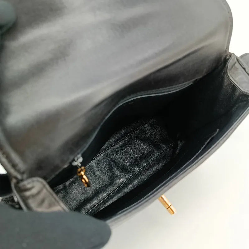 c357-chanel-vintage-black-lambskin-chevron-flap-bag