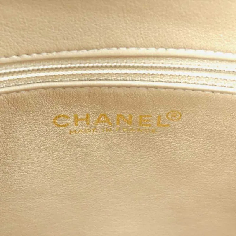 jr503-chanel-vintage-beige-and-black-lambskin-quilted-shopping-bag