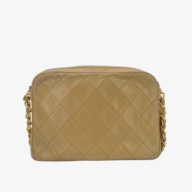 jw564-chanel-vintage-beige-lambskin-tassel-camera-bag