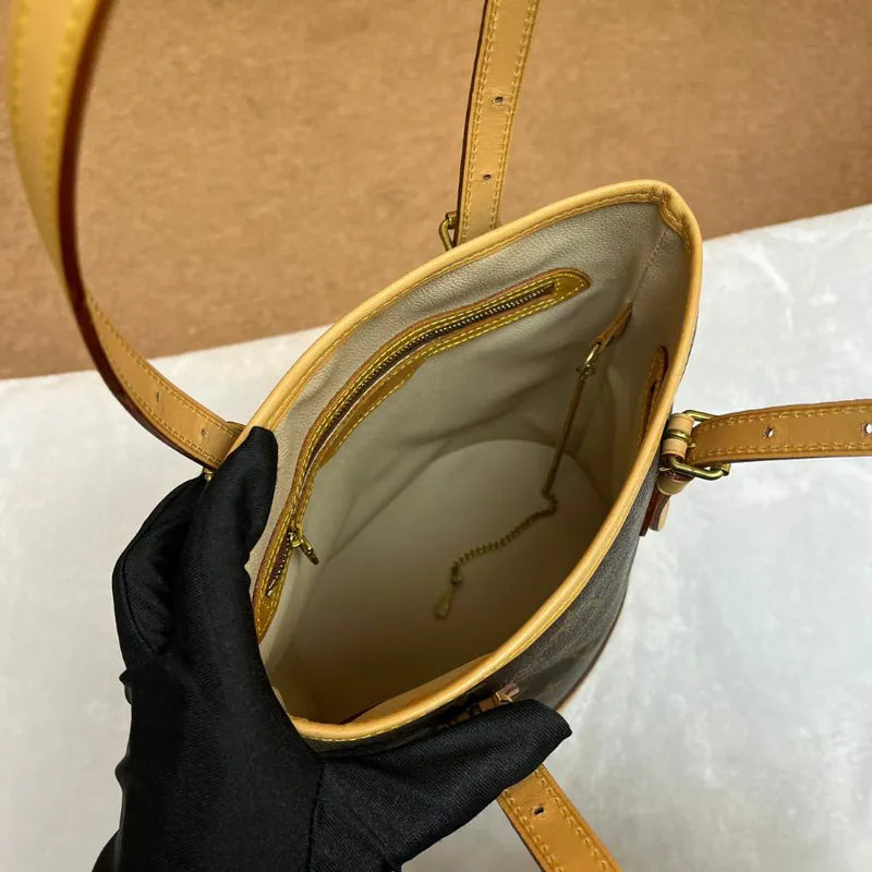 jw242-louis-vuitton-vintage-petite-monogram-bucket-bagrepaired-item