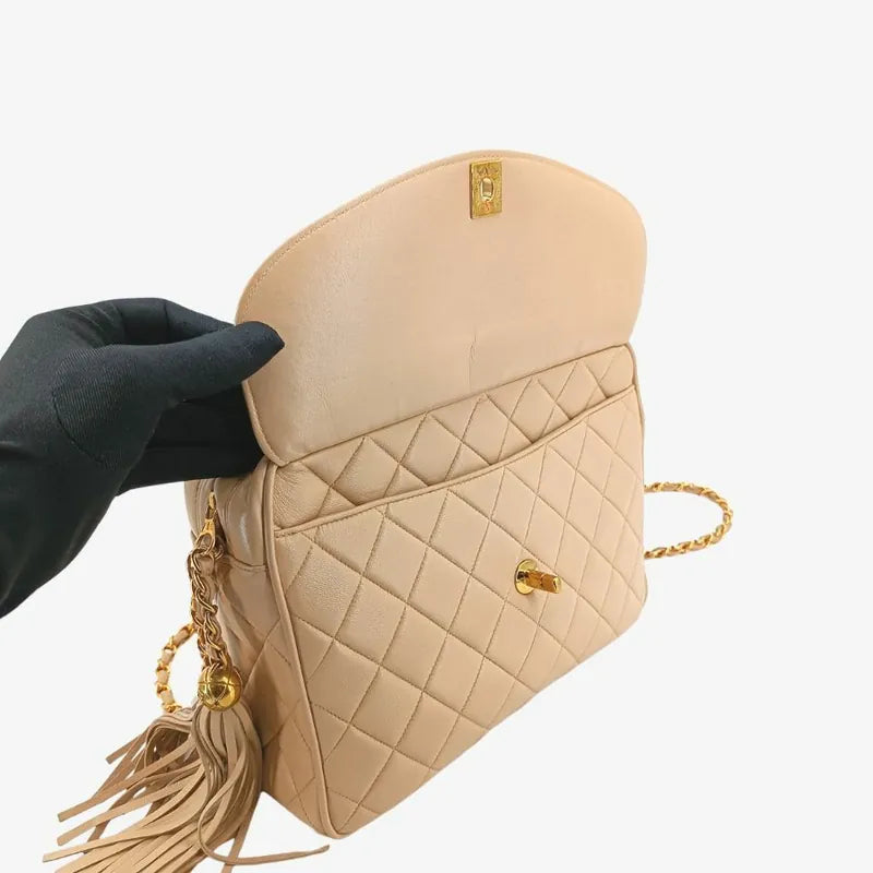 jah126-chanel-vintage-beige-lambskin-tassel-camera-bag