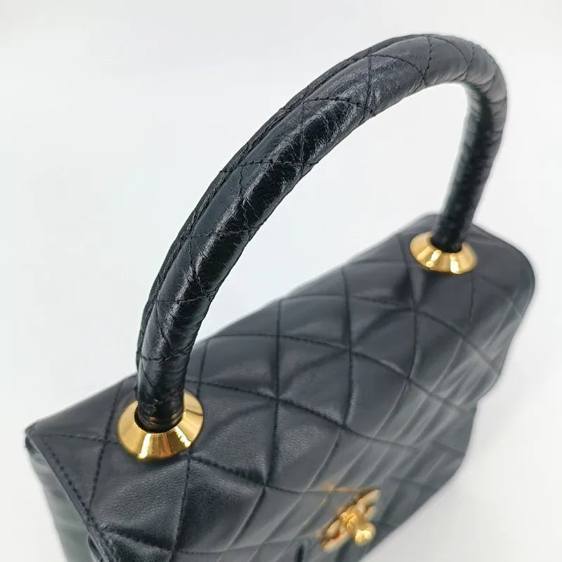 ra015-chanel-vintage-black-lambskin-quilted-handbag