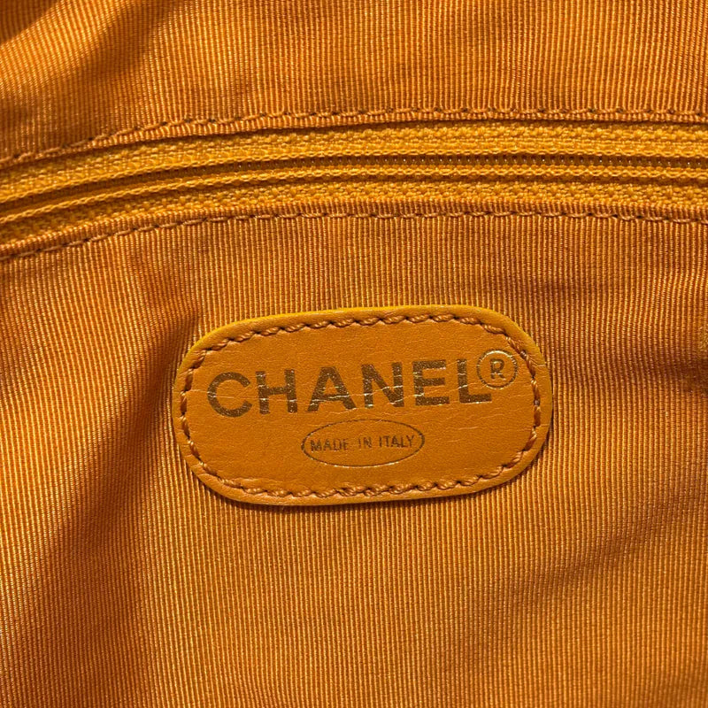 jw563-chanel-vintage-mustard-lambskin-cc-embossed-tote-bag