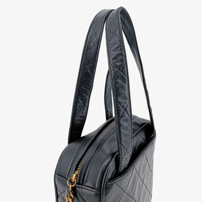 ju691-chanel-vintage-black-lambskin-quilted-handbag