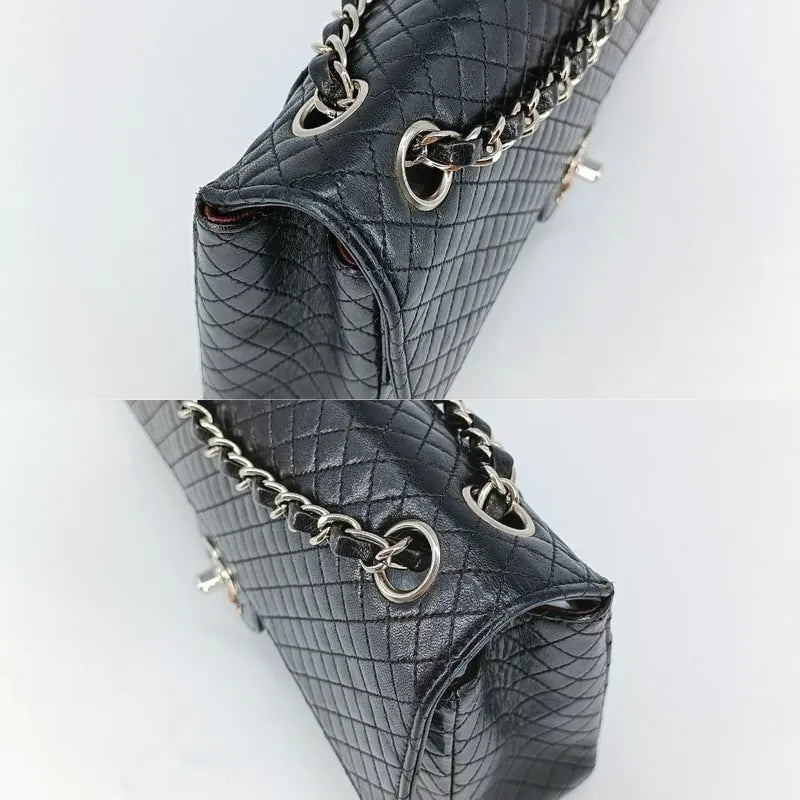 90201267-chanel-vintage-black-lambskin-quilted-flap-bag