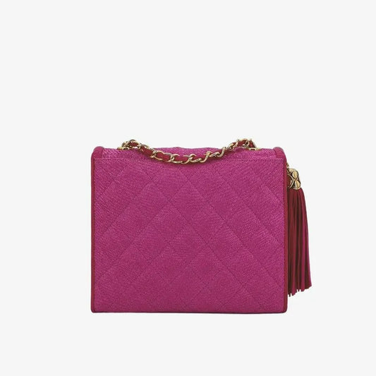 ra444-chanel-vintage-pink-raffia-asymmetric-flap-bag
