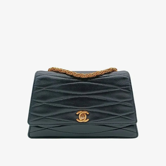 ra549-chanel-vintage-black-lambskin-trapezoid-leaf-shape-flap-bag