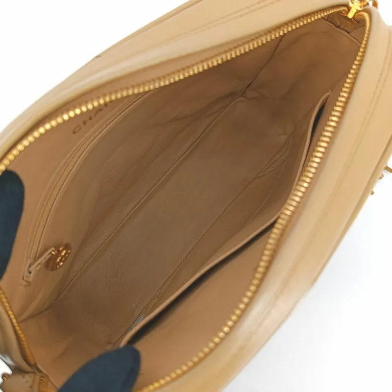 jt620-chanel-vintage-beige-lambskin-gold-chain-camera-bag