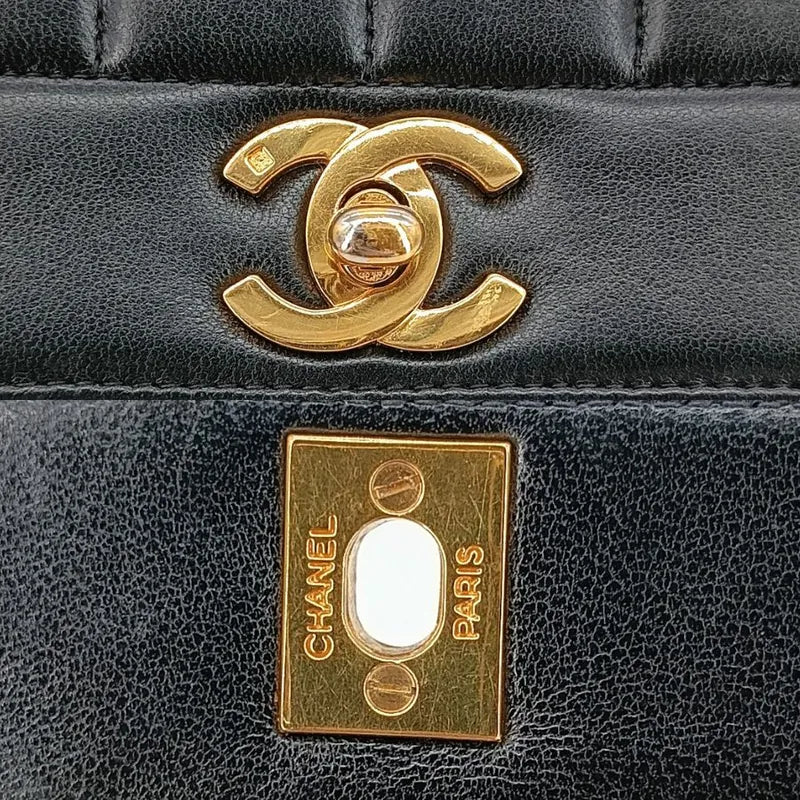 c365-chanel-vintage-black-lambskin-vertical-flap-bag