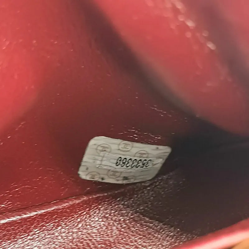 js675-chanel-vintage-black-lambskin-gold-chain-flap-bag