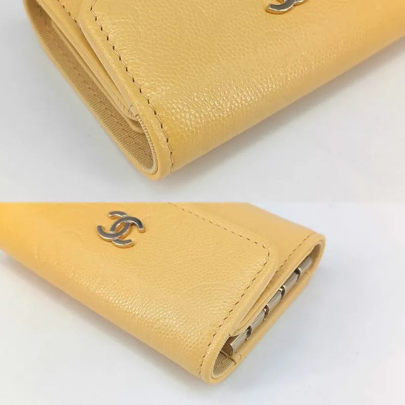 jt400-chanel-yellow-caviar-leather-camellia-flap-4-key-holder