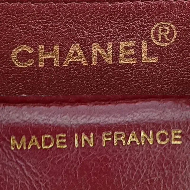 rb125-chanel-vintage-black-lambskin-tall-diana-flap-bag-with-back-pocket