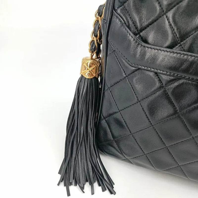 jr668-chanel-vintage-black-lambskin-tassel-camera-bag