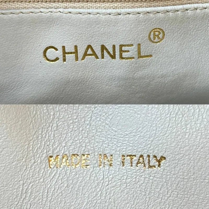 jx330-chanel-vintage-beige-lambskin-quilted-camera-bag