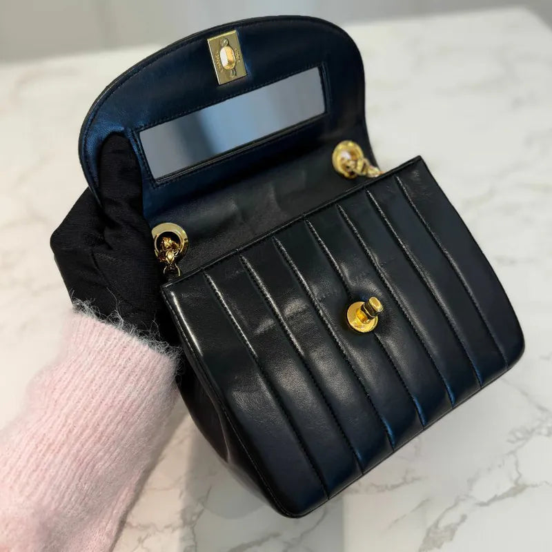 rc769-chanel-vintage-black-lambskin-vertical-gold-chain-flap-bag