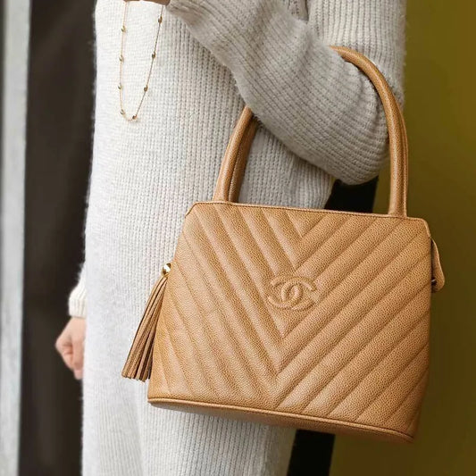 jr876-chanel-vintage-beige-caviar-leather-handbag