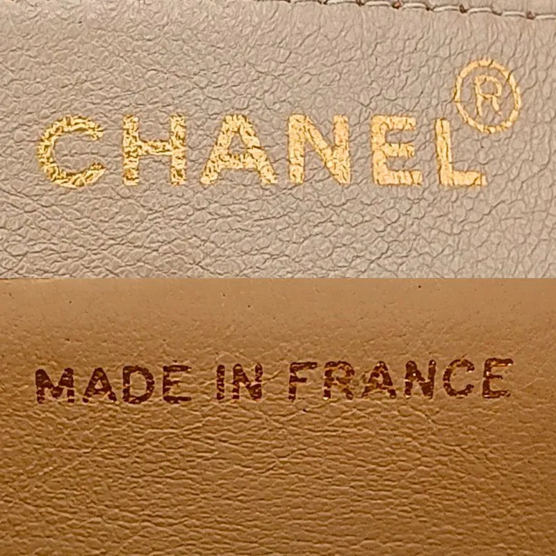 ra822-chanel-vintage-beige-lambskin-gold-chain-flap-bag