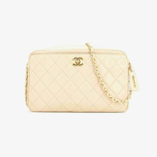 js006-chanel-vintage-beige-lambskin-quilted-camera-bag