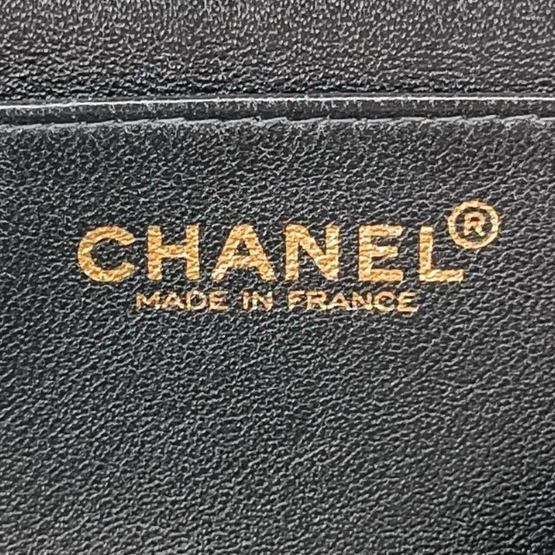 ra468-chanel-vintage-black-caviar-leather-kelly-handbag