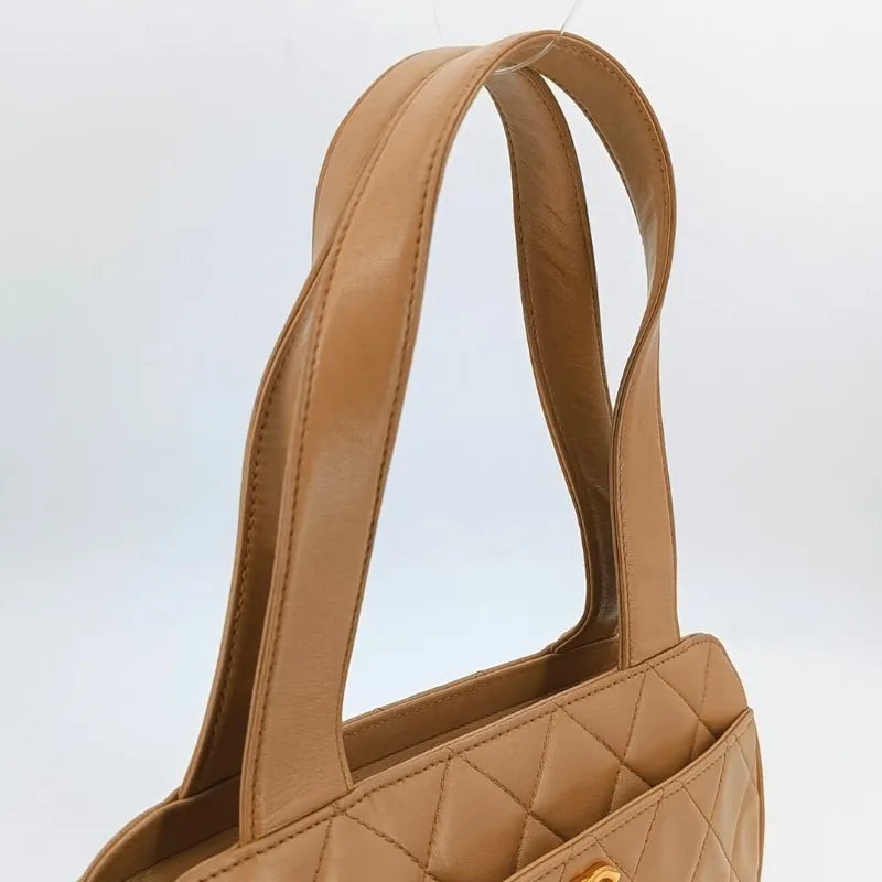 ra491-chanel-vintage-beige-lambskin-quilted-handbag