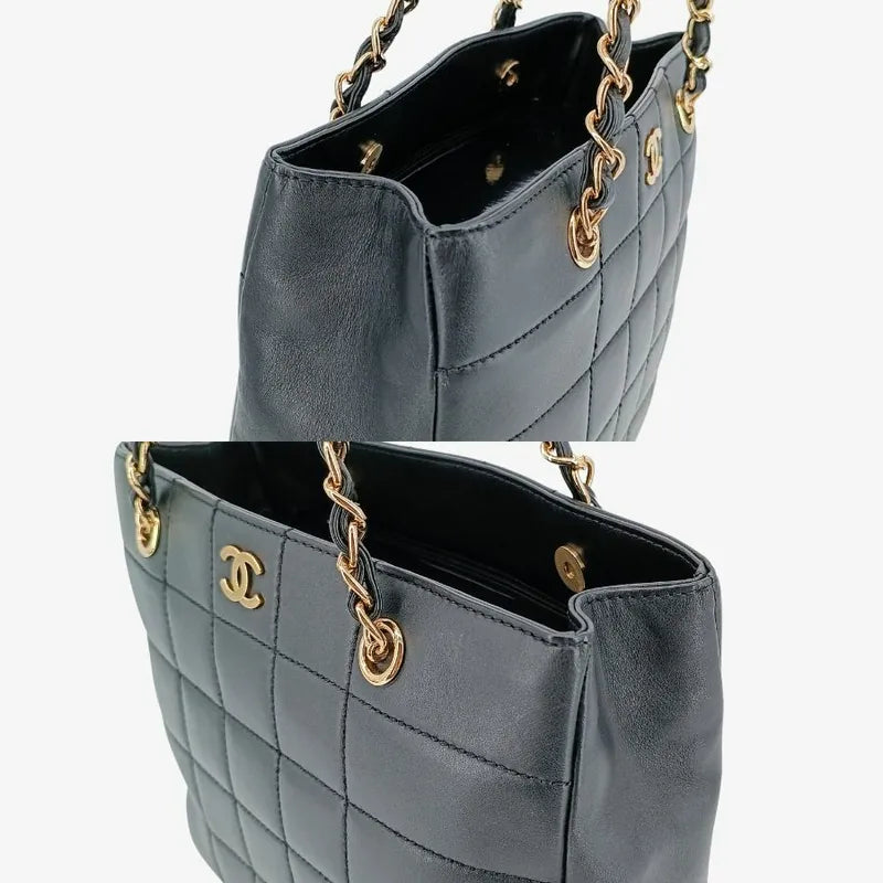 jt731-chanel-vintage-black-calfskin-chocolate-bar-tote-bag