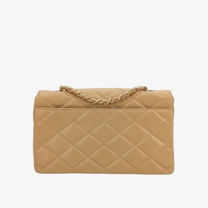 jt759-chanel-vintage-beige-lambskin-pointed-flap-bag