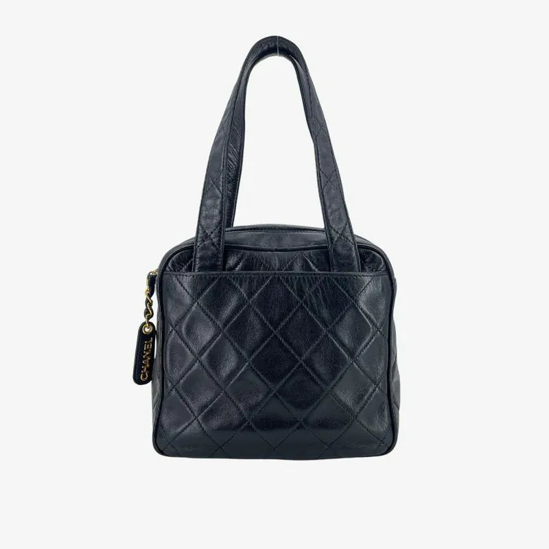 jx726-chanel-vintage-black-lambskin-quilted-handbag