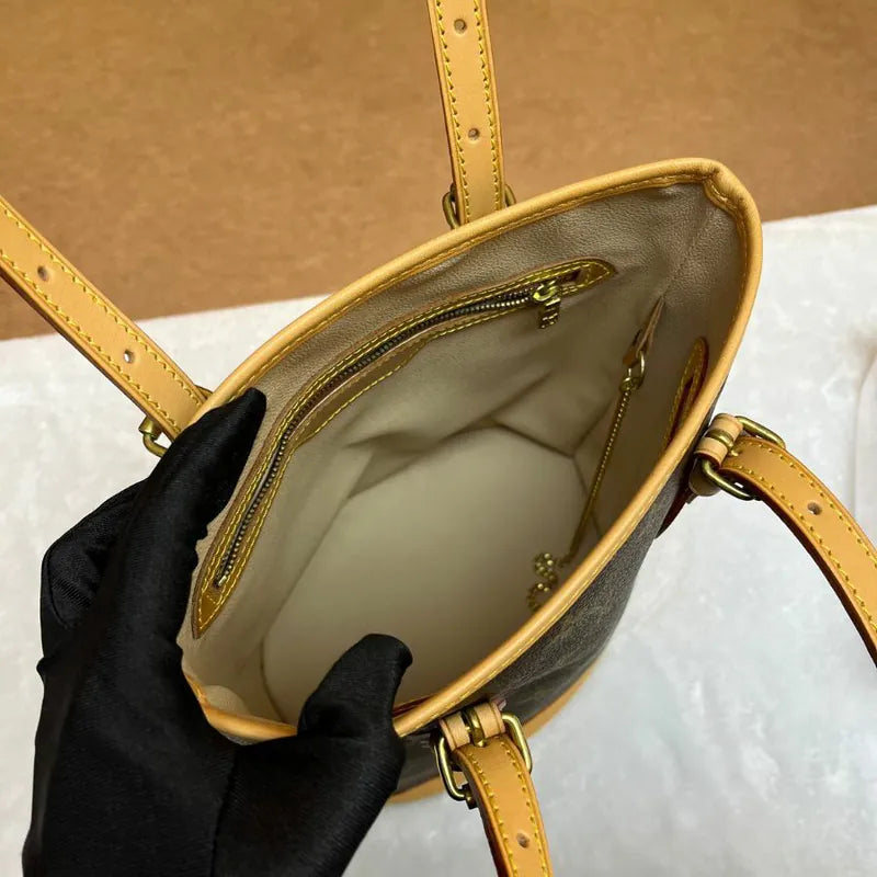 rb938-louis-vuitton-vintage-petite-monogram-bucket-bagrepaired-item