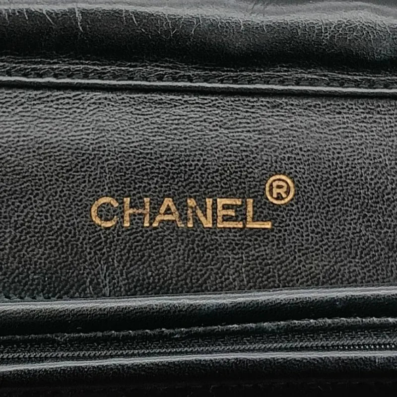jt916-chanel-vintage-black-lambskin-half-moon-flap-bag