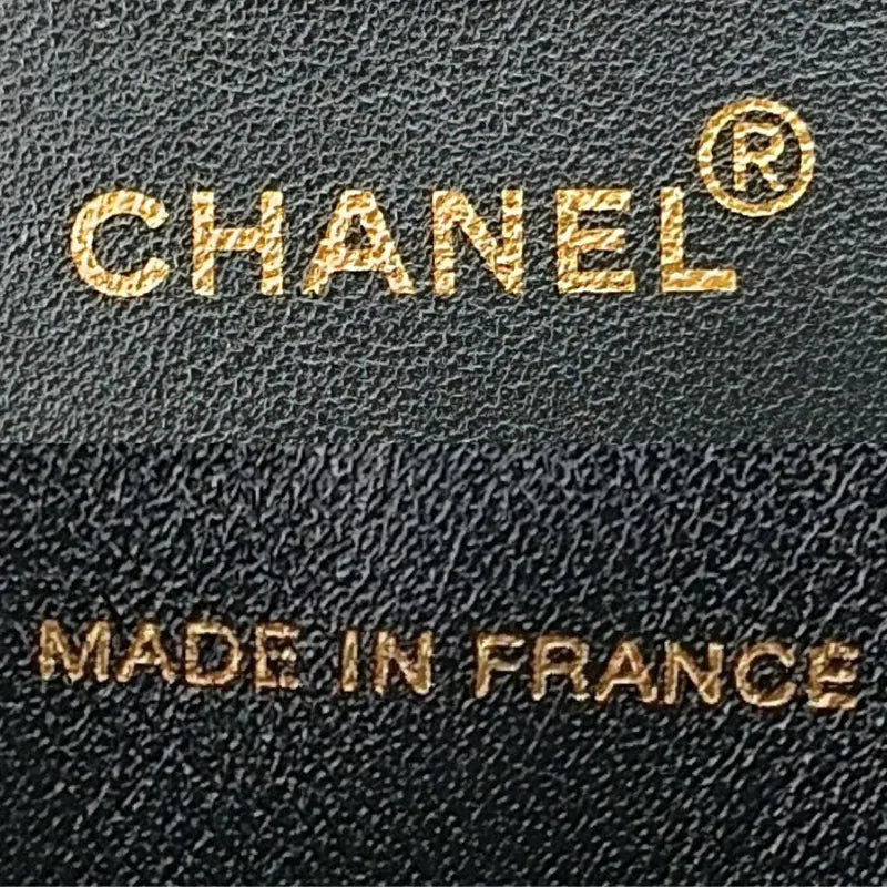 ra555-chanel-vintage-black-lambskin-quilted-handbag