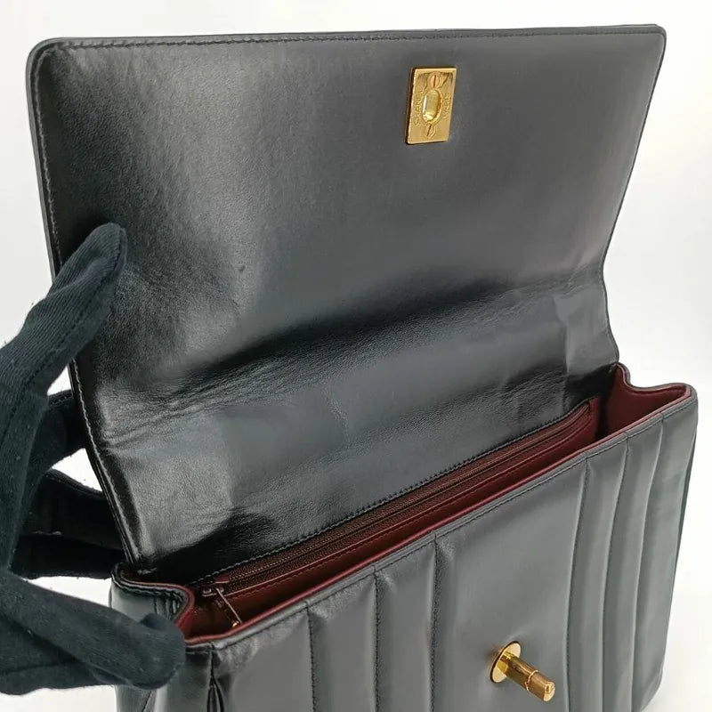 ra658-chanel-vintage-black-lambskin-vertical-flap-handbag