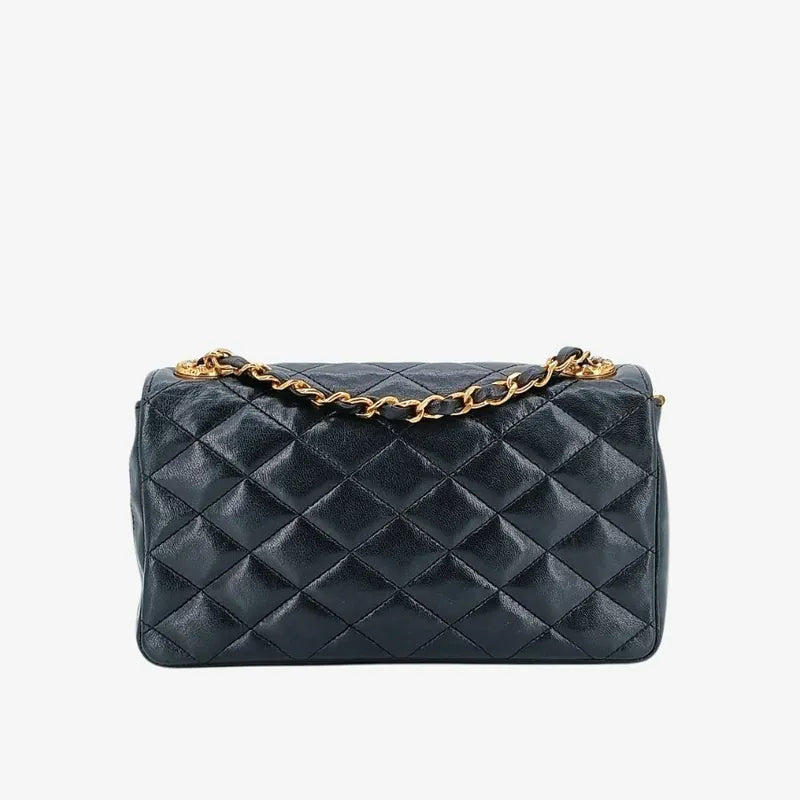 c402-chanel-vintage-black-lambskin-crystal-embellished-pointed-flap-bag