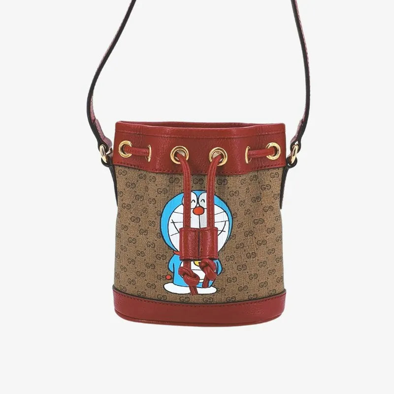 jt252-gucci-x-doraemon-gg-supreme-monogram-mini-bucket-bag
