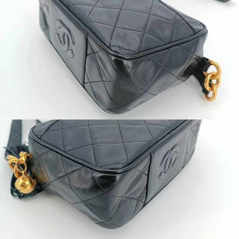js491-chanel-vintage-black-lambskin-quilted-tassels-camera-bag